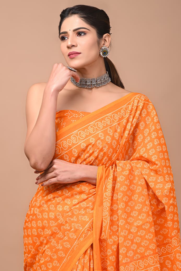 Radiant Tangerine Mul Cotton Saree with Delicate Putta Design