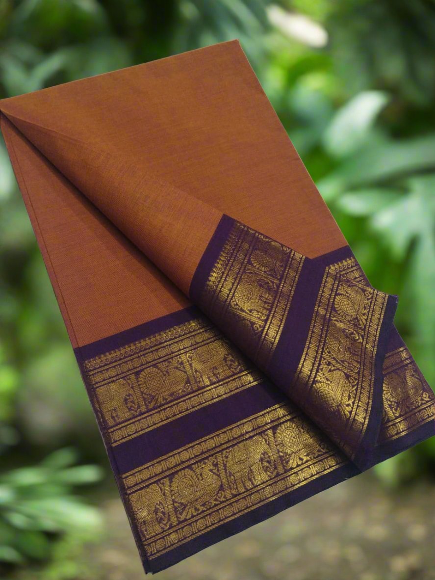 Opulent Golden Red Chettinadu Cotton Saree with Wine Elephant and Peacock Motif Border