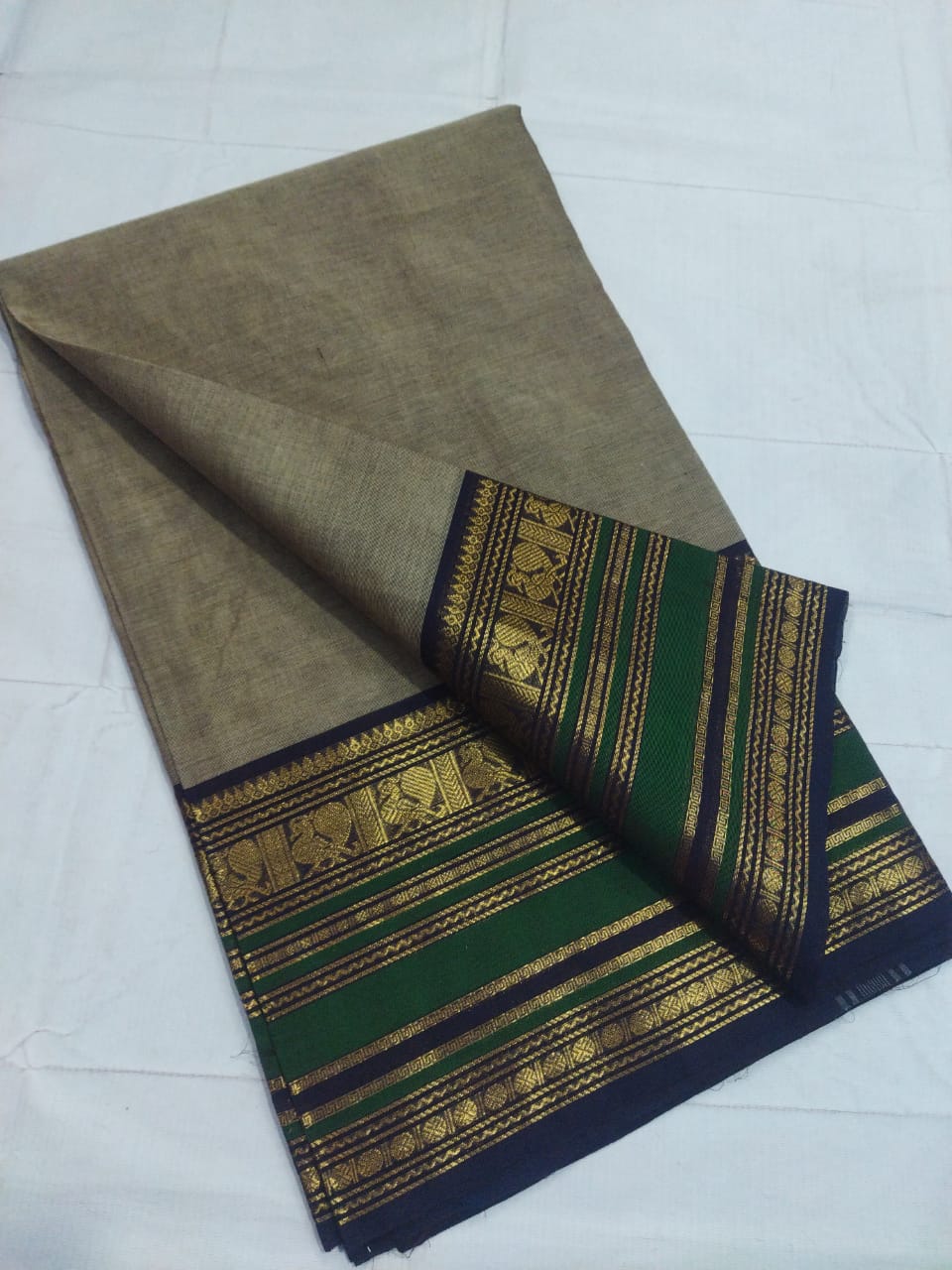 Sophisticated Tan Chettinadu Cotton Saree with Black Peacock Motif Border