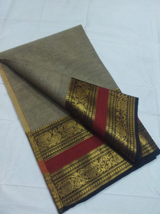 Timeless Tan Chettinadu Cotton Saree with Brown Peacock Motif Border