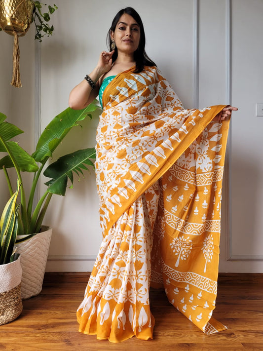 Radiant Heritage: Yellow Mulcotton Saree with Batik Prints