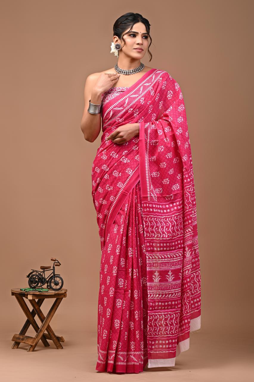 Caption: Blossom Beauty: Pink Mulcotton Saree with Floral Prints