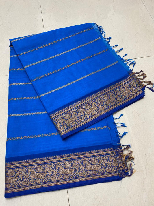 Elevate your style with our Blue Kanchi Cotton Saree featuring Velthaari patterns.