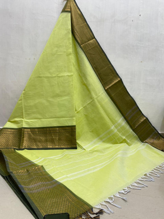 Illuminate your style with our Lemon Yellow Kanchi Cotton Saree featuring a Green Border.