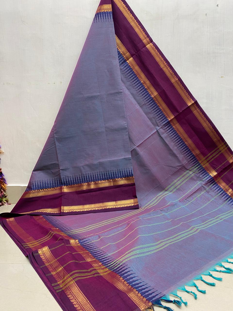 Discover grace with our Lave Kanchi Cotton Saree featuring a Purple Retta Petta border.